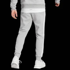 Essentials Fleece 3-Stripes Tapered Cuff Joggers, miesten collegehousut - Vapaa-Ajan Housut - Essentials Fleece 3-Stripes Tapered Cuff Joggers, miesten collegehousut