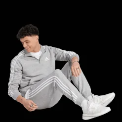 Essentials Fleece 3-Stripes Tapered Cuff Joggers, miesten collegehousut - Vapaa-Ajan Housut - Essentials Fleece 3-Stripes Tapered Cuff Joggers, miesten collegehousut